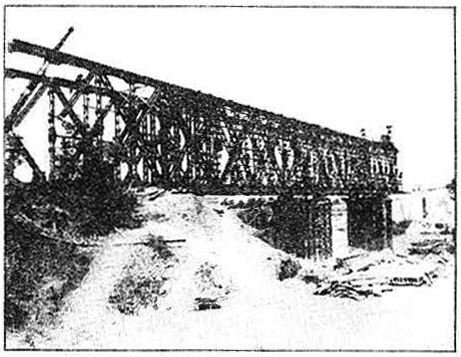 German steel, captured from the retreating enemy, was used on the Garigliano river bridge. Plans were drawn for it at MRS H.Q.